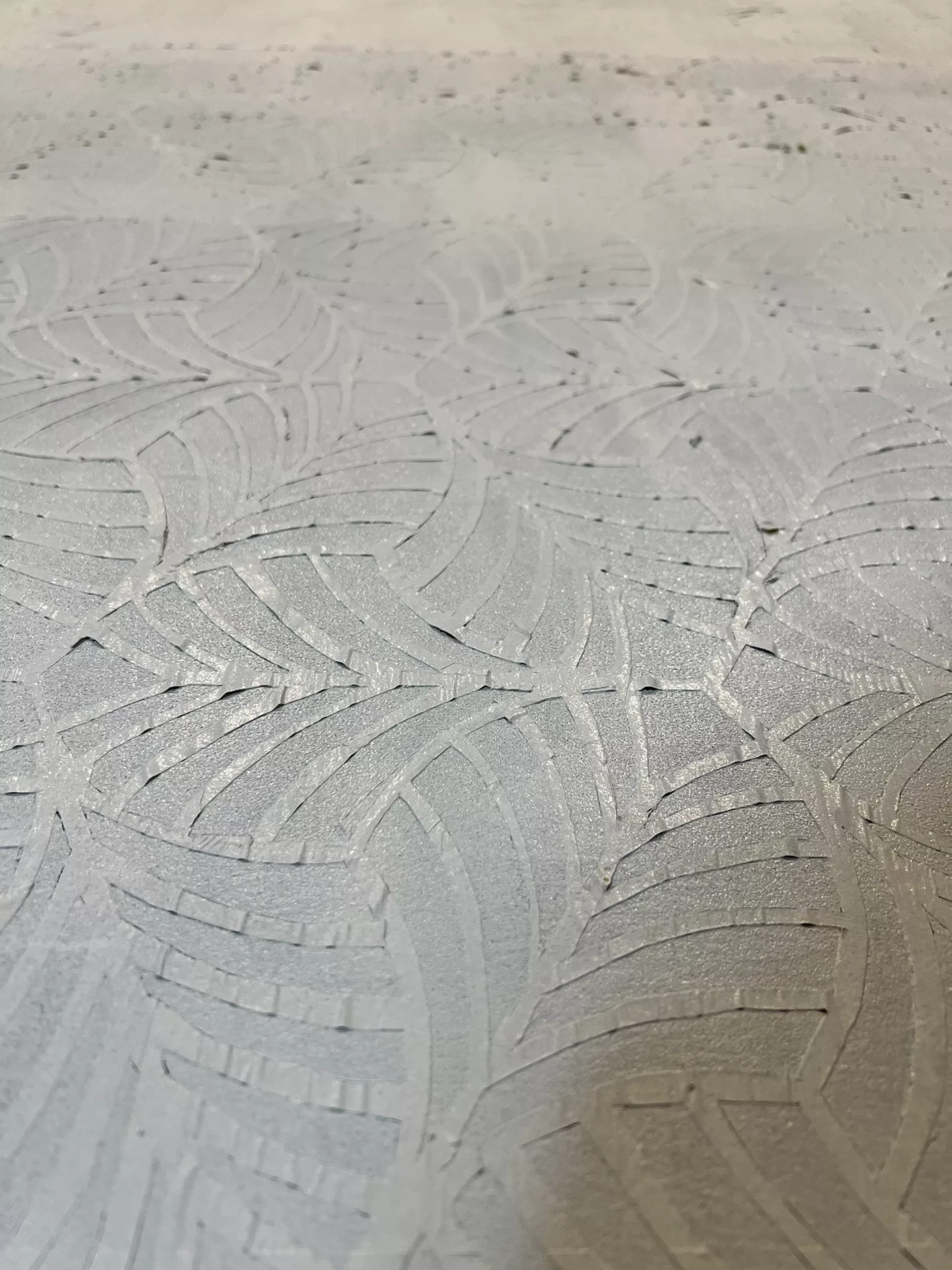 The tape was painted over in white, with the vision of making the tape black and what remains, white.