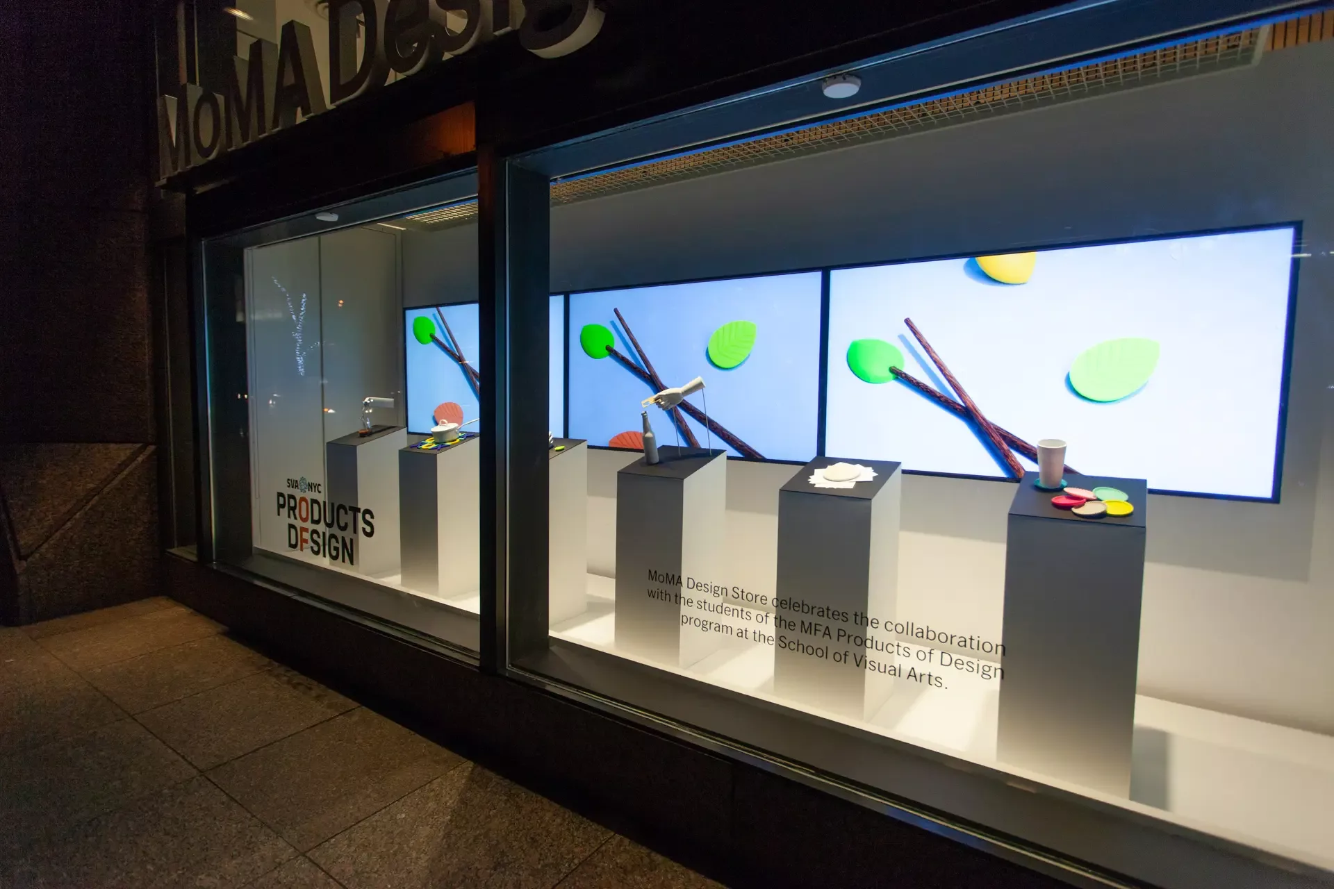 A picture of the Midtown Manhattan MoMA Design Store featuring the Ambi Chopsticks and Holders advertising.